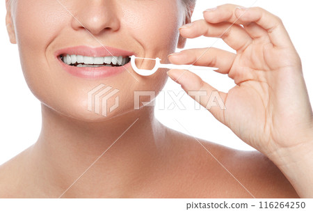Woman with dental floss pick on white background Woman with dental floss pick on white background 116264250