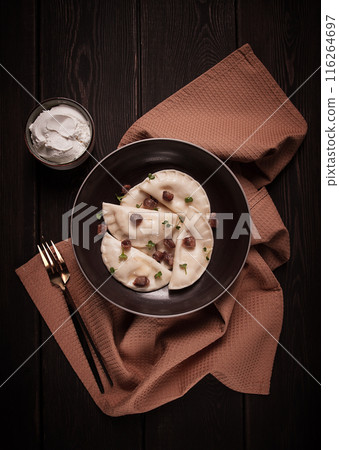 Pierogi, a traditional dish of Polish cuisine, dumplings, top view, close-up, no people, Pierogi, a traditional dish of Polish cuisine, dumplings, top view, close-up, no people, 116264697