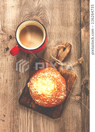 pastries, breakfast, a bun with cottage cheese and a cup of coffee, top view, no people, pastries, breakfast, a bun with cottage cheese and a cup of coffee, top view, no people, 116264735