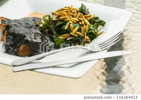 Beef meat and black sauce with beans 116264813