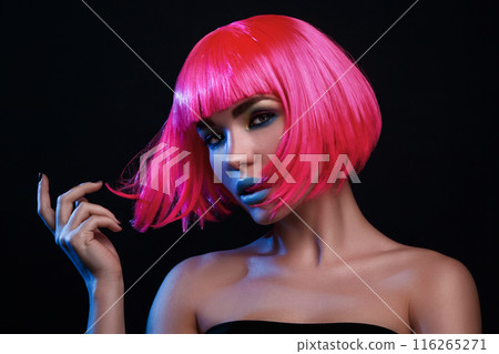 Potrait of young woman with pink hair Potrait of young woman with pink hair 116265271