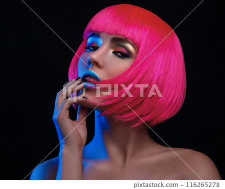 Potrait of young woman with pink hair 116265278
