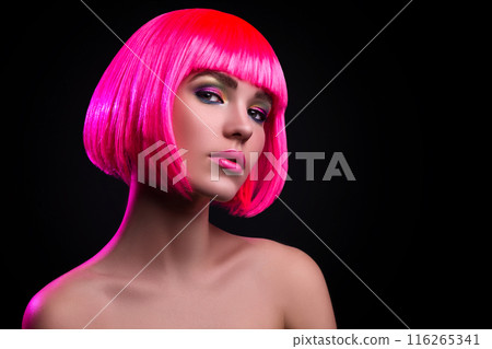 Potrait of young woman with pink hair 116265341