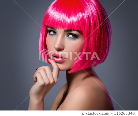 Potrait of young woman with pink hair 116265346