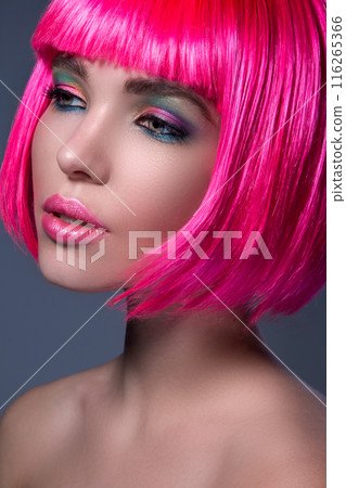 Potrait of young woman with pink hair Potrait of young woman with pink hair 116265366