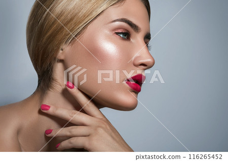 Portrait of beautiful blonde girl with red lips Portrait of beautiful blonde girl with red lips 116265452