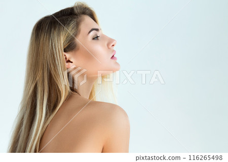 Portrait of beautiful blonde woman in studio 116265498