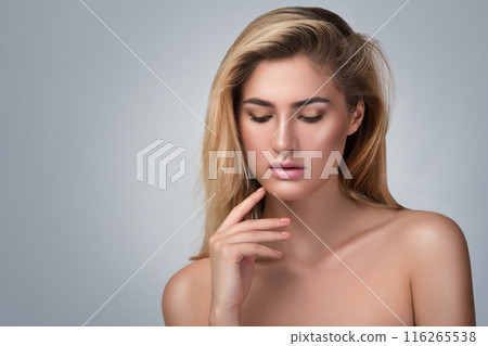 Portrait of beautiful blonde woman in studio Portrait of beautiful blonde woman in studio 116265538