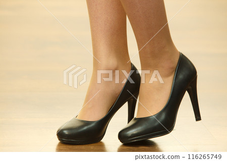 Unrecognizable woman wearing high heels Unrecognizable woman wearing high heels 116265749