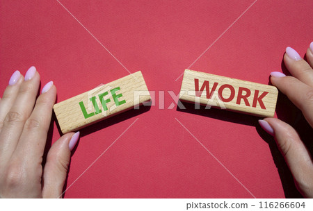 Life or Work symbol. Concept word Life or Work on wooden blocks. Businessman hand. Beautiful red background. Business and Life or Work concept. Copy space 116266604