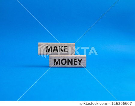 Make Money symbol. Wooden blocks with words Make Money. Beautiful blue background. Business and Make Money concept. Copy space. Make Money symbol. Wooden blocks with words Make Money. Beautiful blue background. Business and Make Money concept. Copy space. 116266607