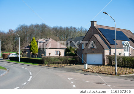 .Zellik, Flemish Brabant, Belgium - Bending road in a residential 116267266