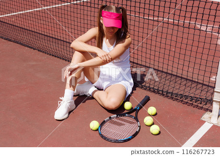a young tennis player was injured while playing tennis, big tennis concept, sports injuries 116267723