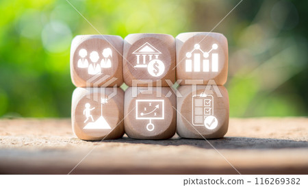 Wooden blocks with business icons illustrating Employee Stock Ownership Plans, financial growth, teamwork, and strategic planning. Wooden blocks with business icons illustrating Employee Stock Ownership Plans, financial growth, teamwork, and strategic planning. 116269382