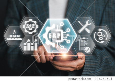 Businessman interacting with ERP icons on a digital interface, representing integrated business management solutions and technology. 116269391