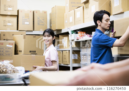 A woman working in a warehouse A woman working in a warehouse 116270450