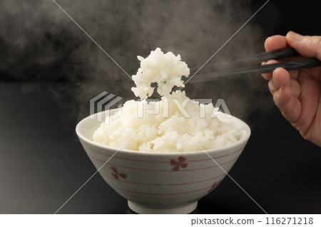Picking up rice with chopsticks Steam 116271218