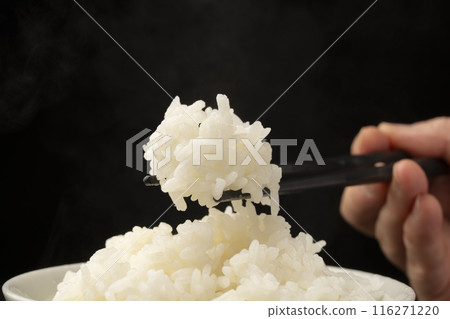 Picking up rice with chopsticks Steam 116271220