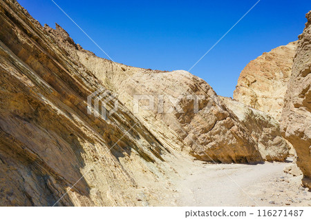 A view of rocks with slanted strata A view of rocks with slanted strata 116271487
