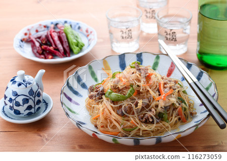 Japchae (mixed vegetables), a traditional Korean dish of stir-fried glass noodles 116273059