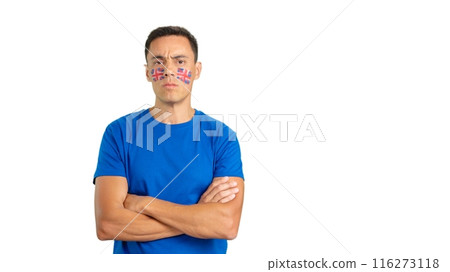 Dignified and serious man with british flag painted on face Dignified and serious man with british flag painted on face 116273118