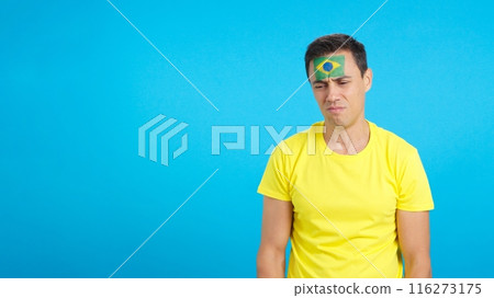 Brazilian supporter during an exciting march that is ultimately lost Brazilian supporter during an exciting march that is ultimately lost 116273175