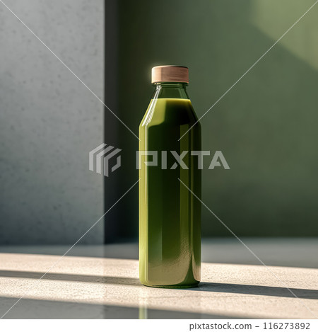Vibrant green smoothie with kiwi, apple, and more fruits in a bottle. 116273892