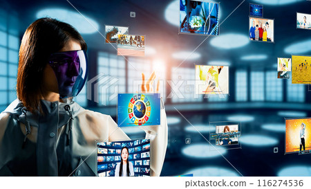Woman watching hologram video 116274536
