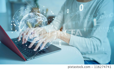 A woman using a personal computer and digital data 116274741