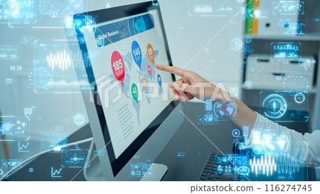 Woman using a computer and digital image 116274745