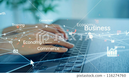 A woman using a personal computer and a network image 116274760