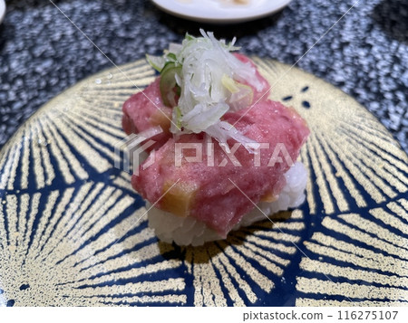 Bluefin tuna toro-taku roll (sushi in the style of tekka maki) Bluefin tuna toro-taku roll (sushi in the style of tekka maki) 116275107