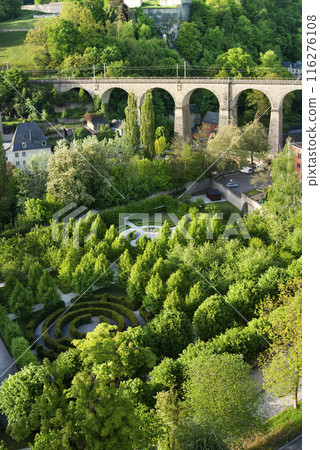 View at maze and railway bridge over Alzette river in Luxembourg city summer time View at maze and railway bridge over Alzette river in Luxembourg city summer time 116276108