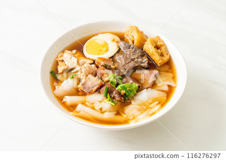 paste of rice flour or boiled Chinese pasta square in clear soup paste of rice flour or boiled Chinese pasta square in clear soup 116276297