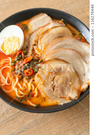 Ramen Noodles Spicy Tomyum Soup with Roast Pork 116276440