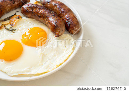 double fried egg with pork sausage double fried egg with pork sausage 116276740