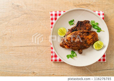 spicy grilled jamaican jerk chicken 116276785
