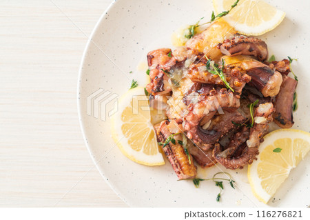 grilled octopus or squid with butter lemon sauce grilled octopus or squid with butter lemon sauce 116276821