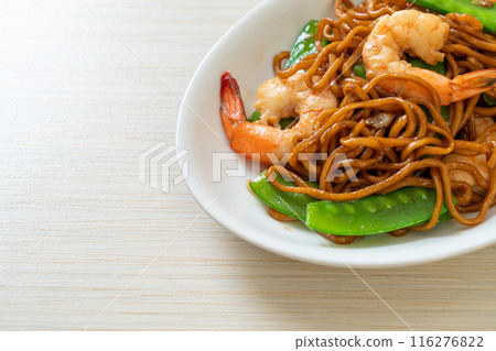 stir-fried yakisoba noodles with green peas and shrimps stir-fried yakisoba noodles with green peas and shrimps 116276822