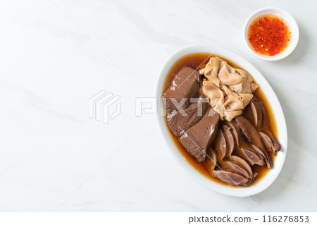 stewed duck offal in brown soup stewed duck offal in brown soup 116276853