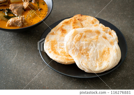 Chicken curry soup with roti Chicken curry soup with roti 116276881