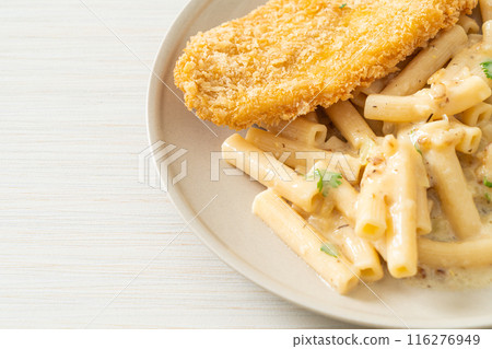 quadrotto penne pasta white cream sauce with fried fish 116276949