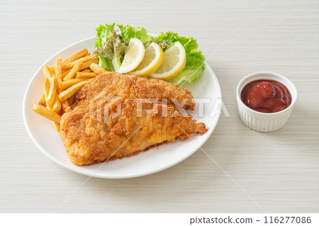 Homemade Breaded Weiner Schnitzel with Potato Chips Homemade Breaded Weiner Schnitzel with Potato Chips 116277086