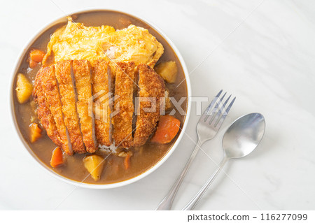 curry rice with fried pork cutlet and creamy omelet curry rice with fried pork cutlet and creamy omelet 116277099
