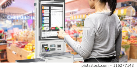 Customer use self-checkout kiosk or self-service payment machine Customer use self-checkout kiosk or self-service payment machine 116277148