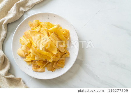 Banana Chips - fried or baked sliced banana Banana Chips - fried or baked sliced banana 116277209