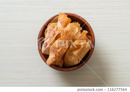 Taro Chips - fried or baked sliced taro Taro Chips - fried or baked sliced taro 116277564