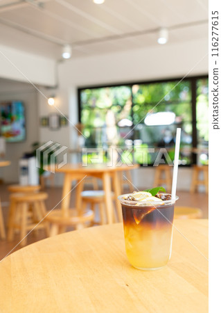lemon with black coffee in glass lemon with black coffee in glass 116277615