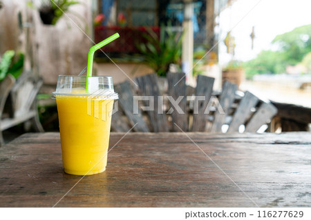 mango smoothies in take away glass 116277629