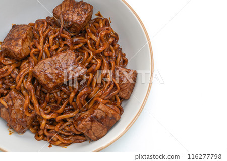 Jjapaguri or Chapaguri, Korean Black Beans Spicy Noodles with Beef on white background 116277798